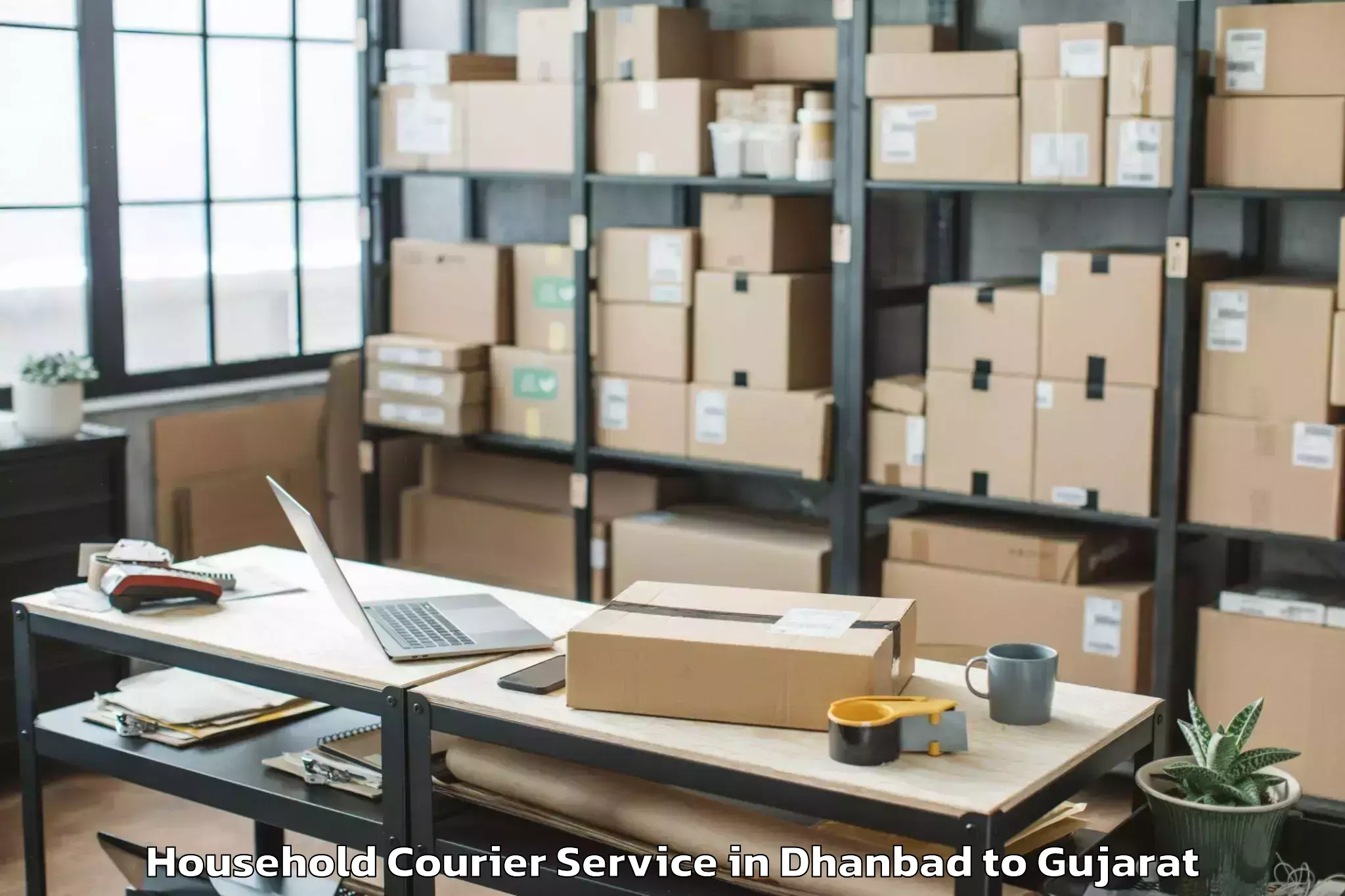 Affordable Dhanbad to Bhachau Household Courier